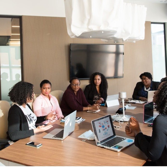 Stylized image incorporating icons that represent key concepts of business administration, like teamwork, finance and management.